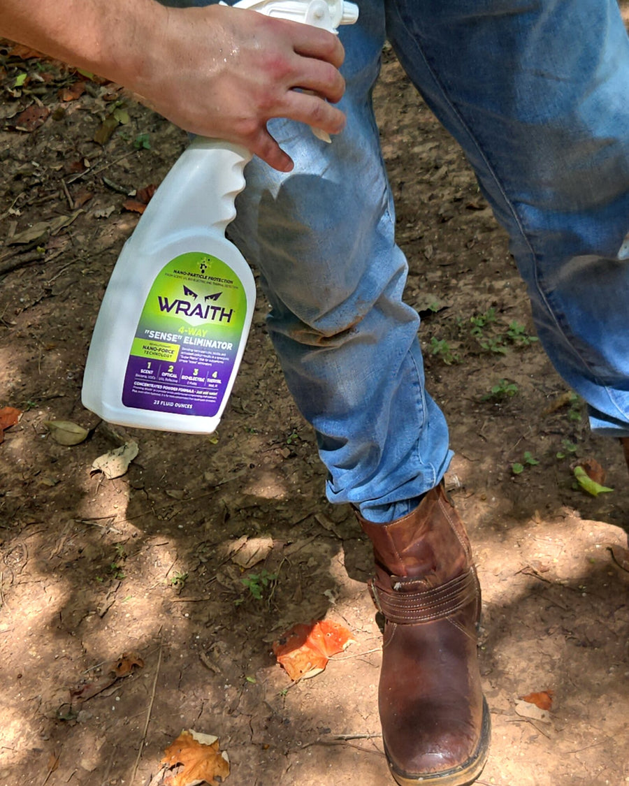 In the field: spraying WRAITH from the 23 oz bottle onto a leather hunting boot